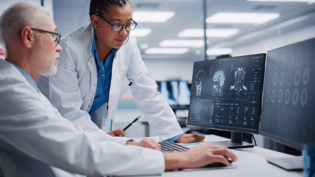 2 doctors checking x-ray images