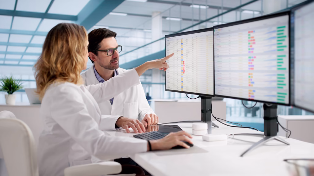 Doctors in front of computer screens
